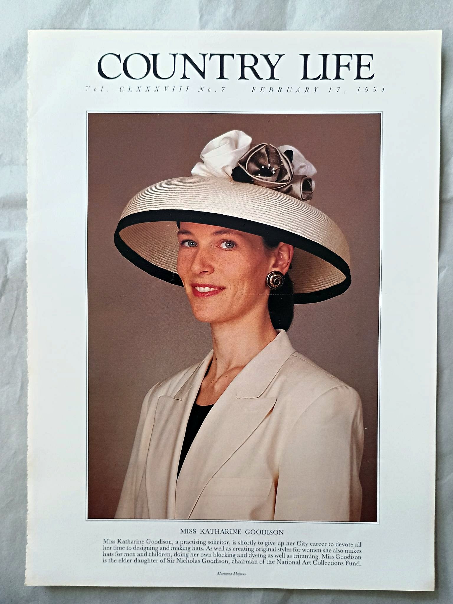 Katharine Goodison Country Life Magazine Portrait February 17, 1994. CLXXXVIII No. 7

Miss Katharine Goodison, a practising solicitor, is shortly to give up her City career to devote all her time to designing and making hats. As well as creating original styles for women she also makes hats for men and children, doing her own blocking and dyeing as well as trimming. Miss Goodison is the elder daughter of Sir Nicholas Goodison, chairman of the National Art Collections Fund