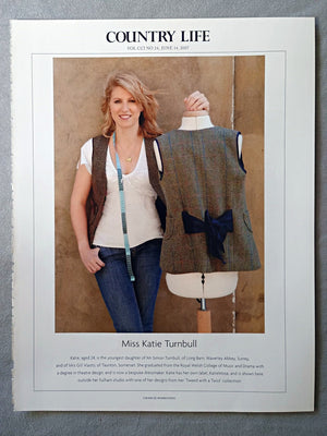 Miss Katie Turnbull - Katie, aged 24, is the youngest daughter of Mr Simon Turnbull, of Long Barn, Waverley Abbey, Surrey, and of Mrs Gill Vlasto, of Taunton, Somerset. She graduated from the Royal Welsh College of Music and Drama with a degree in theatre design, and is now a bespoke dressmaker. Katie has her own label, KatieMosa, and is shown here outside her Fulham studio with one of her designs from her 'Tweed with a Twist' collection.