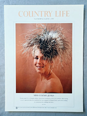 Miss Cozmo Jenks Country Life Magazine Portrait June 3 1999. CXCIII No. 22

Miss Cozmo Jenks - Cozmo, aged 25, is a bespoke milliner, shown here wearing one of her own creations. After serving a year's apprenticeship, she established her own company in Walpole Street, and is now working on commissions for weddings and Ascot