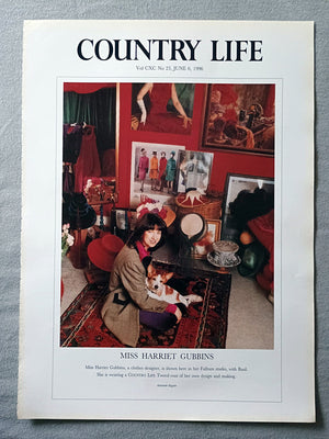 Miss Harriet Gubbins Country Life Magazine Portrait June 6, 1996. CXC No. 23

Miss Harriet Gubbins, a clothes designer, is shown here in her Fulham studio, with Basil. She is wearing a COUNTRY LIFE Tweed coat of her own design and making