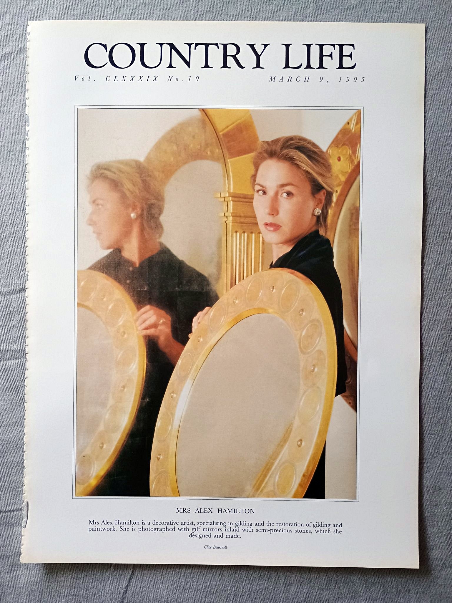 Mrs Alex Hamilton Country Life Magazine Portrait March 9, 1995. CLXXXIX No. 10

Mrs Alex Hamilton is a decorative artist, specialising in gilding and the restoration of gilding and paintwork. She is photographed with gilt mirrors inlaid with semi-precious stones, which she designed and made..