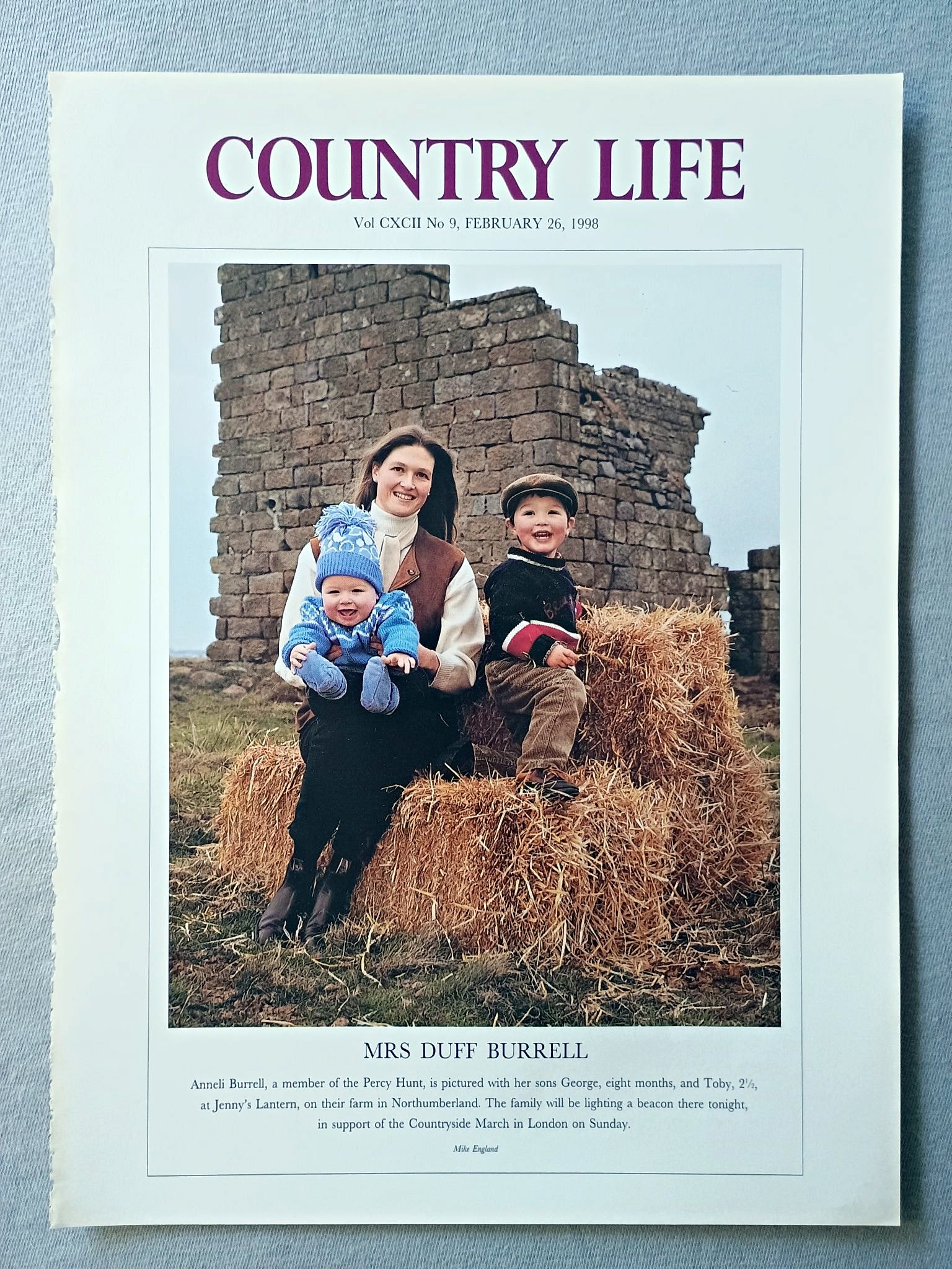Mrs Duff Burrell Country Life Magazine Portrait February 26, 1998. CXCII No. 9

Mrs Duff Burrell - Anneli Burrell, a member of the Percy Hunt, is pictured with her sons George, eight months, and Toby, 2 1/2, at Jenny's Lantern, on their farm in Northumberland. The family will be lighting a beacon there tonight, in support of the Countryside March in London on Sunday.