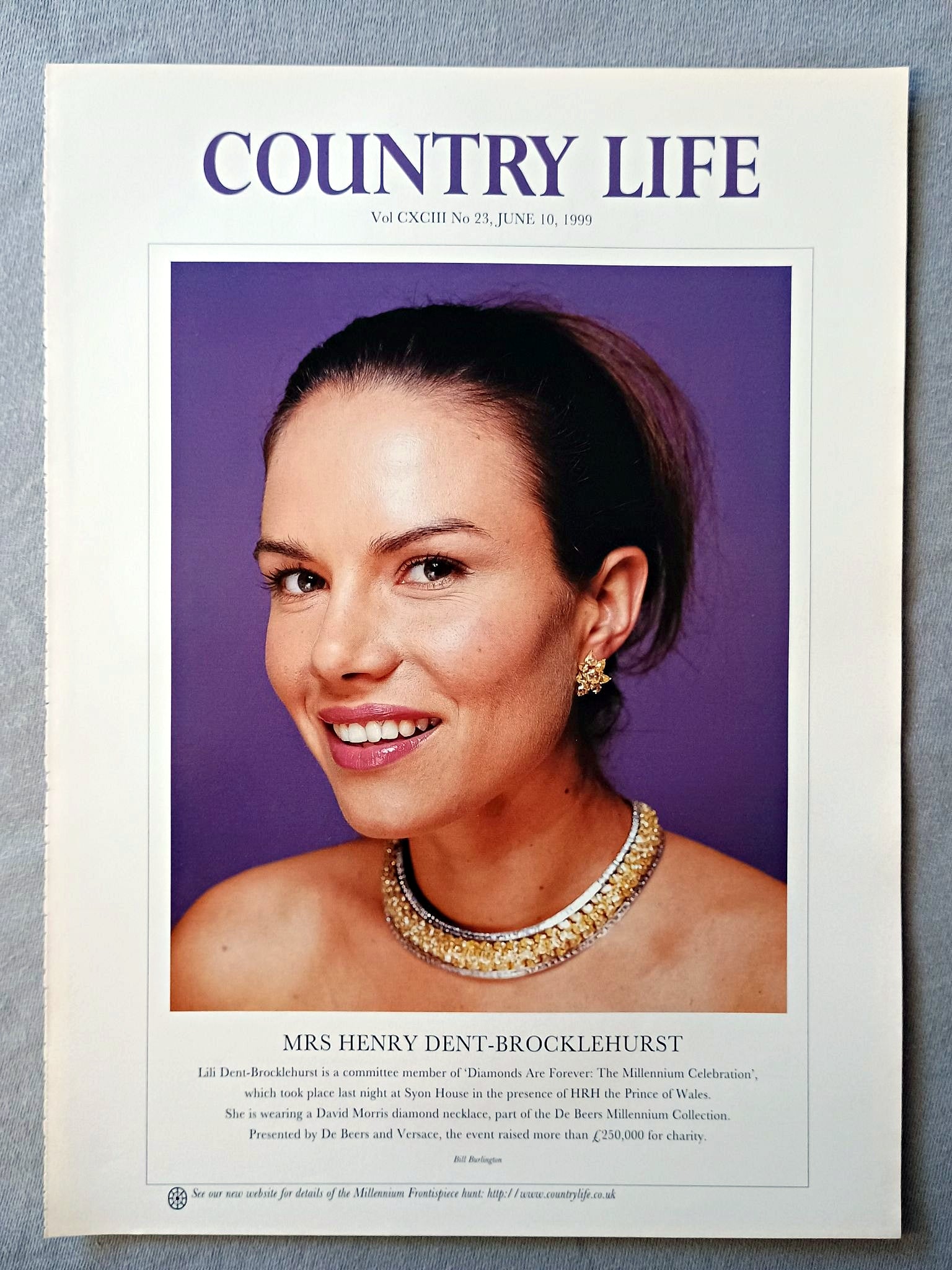 Mrs Henry Dent-Brocklehurst nee Lilikoi Valintine Maltese Country Life Magazine Portrait June 10 1999. CXCIII No. 23

Mrs Henry Dent-Brocklehurst - Lili Dent-Brocklehurst is a committee member of 'Diamonds Are Forever: The Millennium Celebration', which took place last night at Syon House in the presence of HRH the Prince of Wales. She is wearing a David Morris diamond necklace, part of the De Beers Millennium Collection. Presented by De Beers and Versace, the event raised more than £250,000 for charity