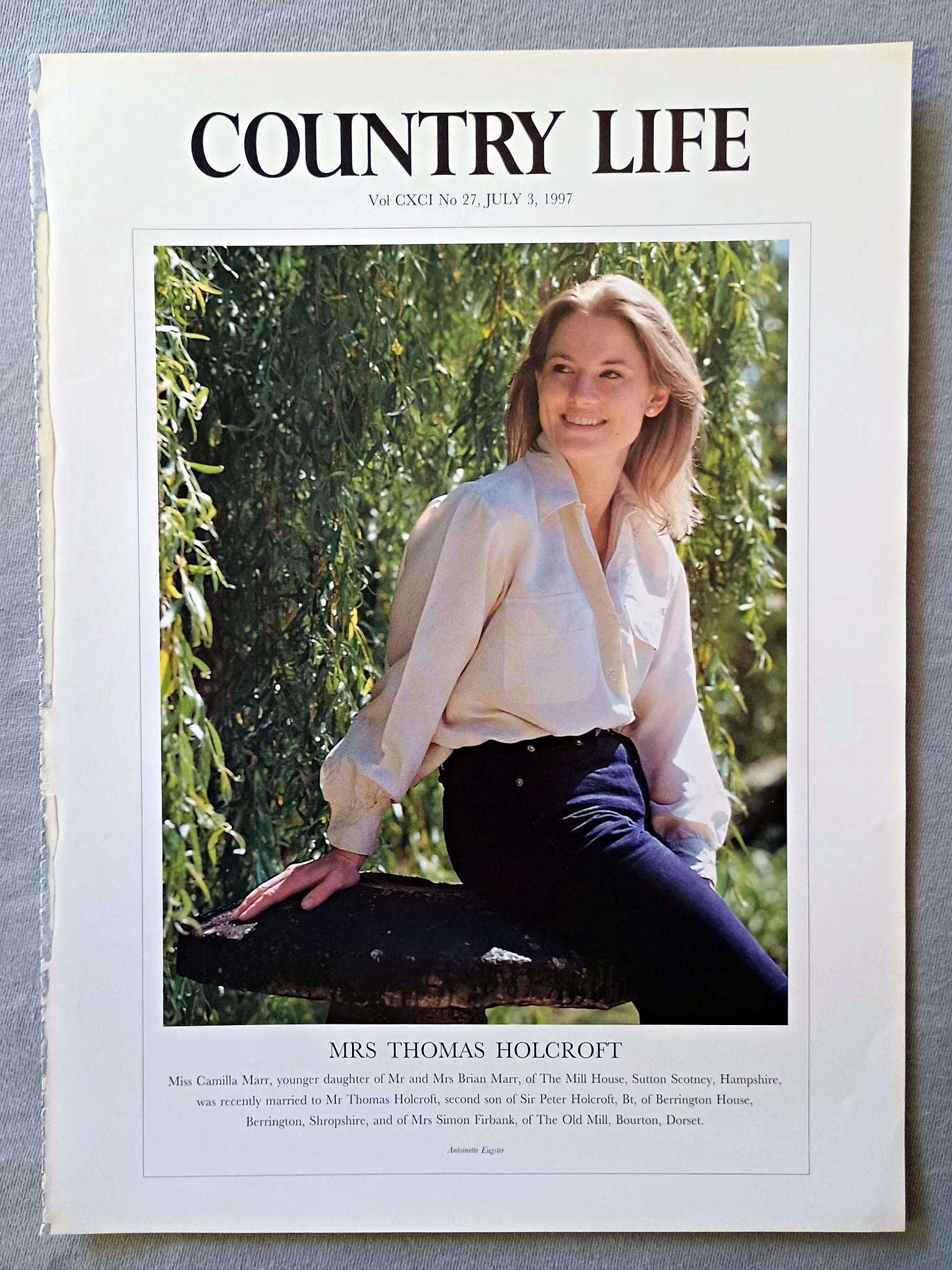 Mrs Thomas Holcroft nee Camilla Marr Country Life Magazine Portrait July 3, 1997. CXCI No. 27

Mrs Thomas Holcroft - Miss Camilla Marr, younger daughter of Mr and Mrs Brian Marr, of The Mill House, Sutton Scotney, Hampshire, was recently married to Mr Thomas Holcroft, second son of Sir Peter Holcroft, Bt, of Berrington House, Berrington, Shropshire, and of Mrs Simon Firbank, of The Old Mill, Bourton, Dorset