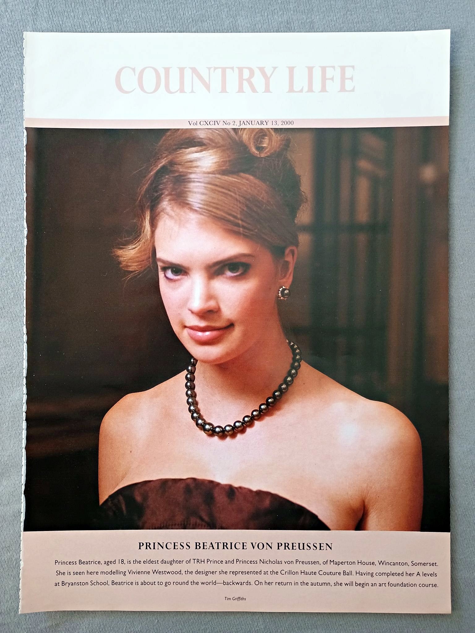 Princess Beatrice Von Preussen Country Life Magazine Portrait January 13 2000. CXCIV No. 2

Princess Beatrice Von Preussen - Princess Beatrice, aged 18, is the eldest daughter of TRH Prince and Princess Nicholas von Preussen, of Maperton House, Wincanton, Somerset. She is seen here modelling Vivienne Westwood, the designer she represented at the Crillon Haute Couture Ball. Having completed her A levels at Bryanston School, Beatrice is about to go round the world-backwards. On her return in the autumn, she w