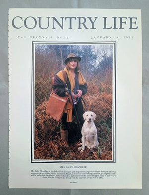 Sally Chandler Country Life Magazine Portrait January 14, 1993. CLXXXVII No. 2.

Mrs Sally Chandler, a pet behaviour therapist and dog trainer, is pictured here during a training session with one of her pupils, Hurtlands Pippit, a 2 1/2-year-old working labrador, a category which will be judged at this year's Crufts on Sunday. Labradors are the second biggest entry in this year's show, but the last time the breed won the supreme award was in 1937