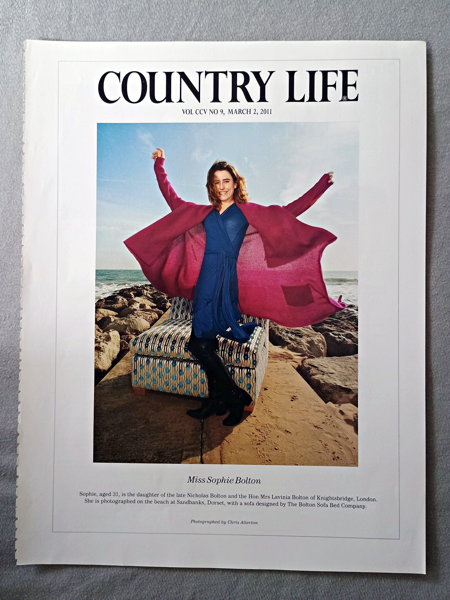 Miss Sophie Bolton - Sophie, aged 31, is the daughter of the late Nicholas Bolton and the Hon Mrs Lavinia Bolton of Knightsbridge, London. She is photographed on the beach at Sandbanks, Dorset, with a sofa designed by The Bolton Sofa Bed Company.