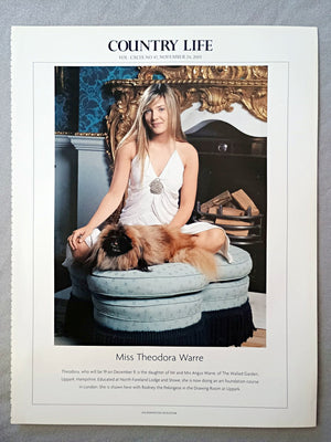 Miss Theodora Warre - Theodora, who will be 19 on December 9, is the daughter of Mr and Mrs Angus Warre, of The Walled Garden, Uppark, Hampshire. Educated at North Foreland Lodge and Stowe, she is now doing an art foundation course in London. She is shown here with Rodney the Pekingese in the Drawing Room at Uppark.
