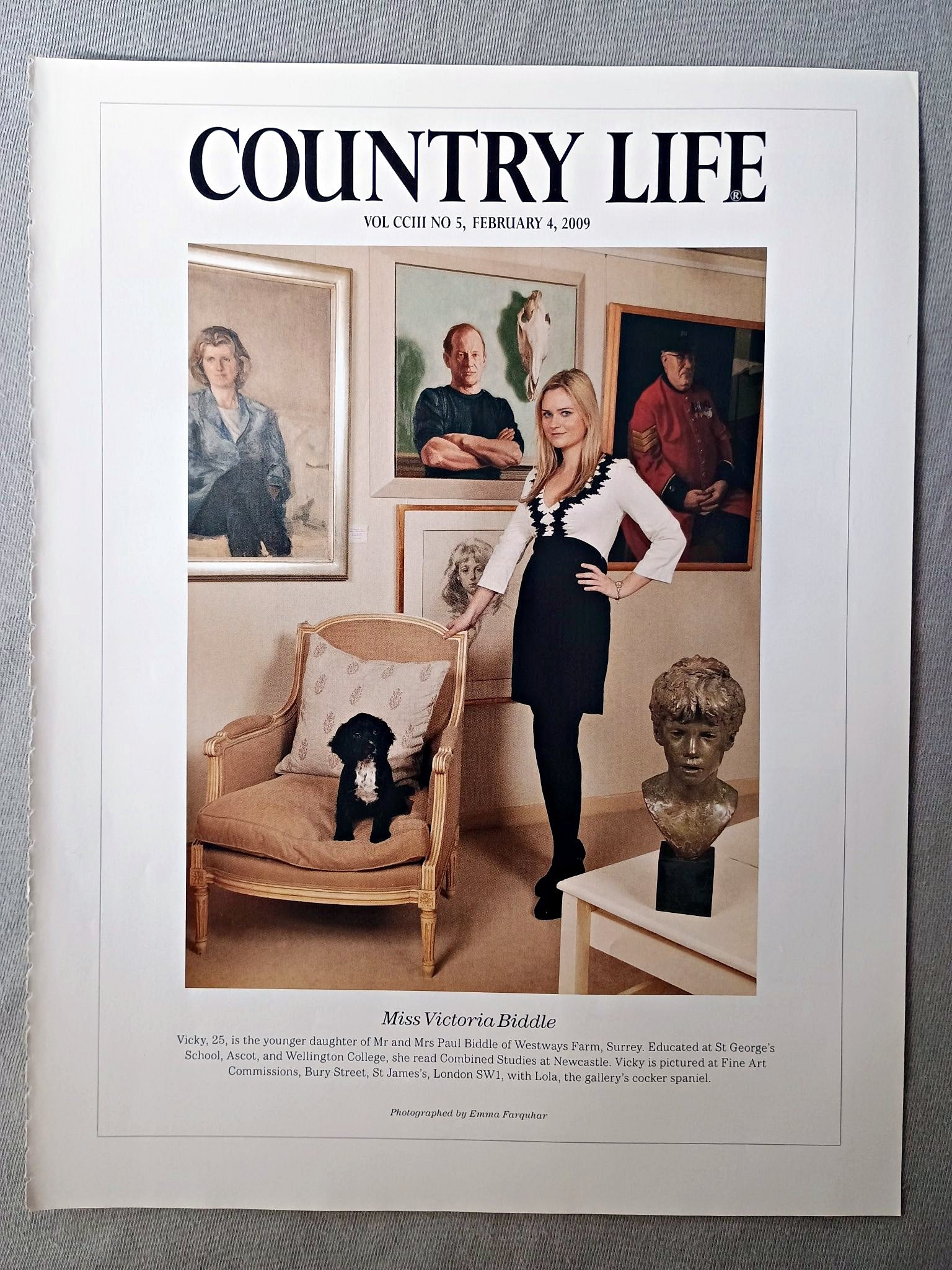 Miss Victoria Biddle - Vicky, 25, is the younger daughter of Mr and Mrs Paul Biddle of Westways Farm, Surrey. Educated at St George's School, Ascot, and Wellington College, she read Combined Studies at Newcastle. Vicky is pictured at Fine Art Commissions, Bury Street, St James's, London SW1, with Lola, the gallery's cocker spaniel.