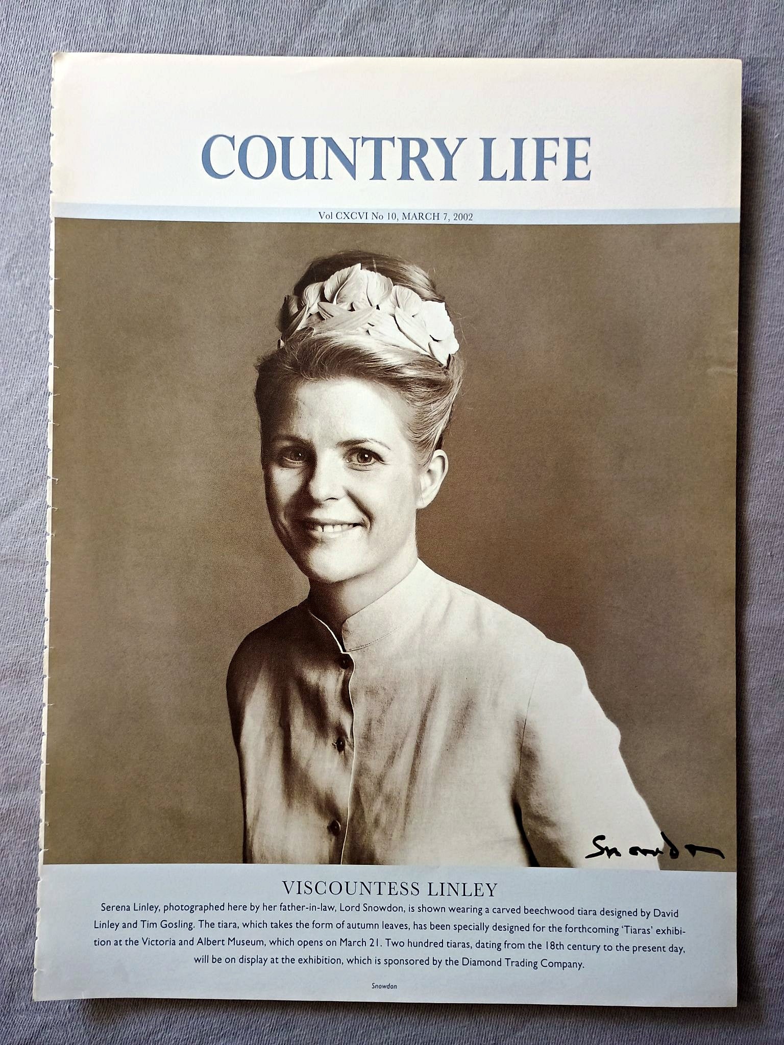 Viscountess Linley - Serena Linley, photographed here by her father-in-law, Lord Snowdon, is shown wearing a carved beechwood tiara designed by David Linley and Tim Gosling. The tiara, which takes the form of autumn leaves, has been specially designed for the forthcoming 'Tiaras' exhibi-tion at the Victoria and Albert Museum, which opens on March 21. Two hundred tiaras, dating from the 18th century to the present day, will be on display at the exhibition, which is sponsored by the Diamond Trading Company